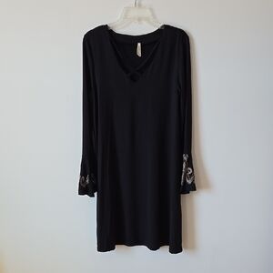 Elegant Black Dress with Embroidered Sleeves